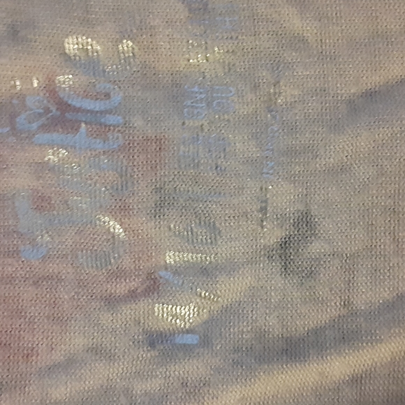 Long sleeved cut shoulder and cross in front - Picture 2 of 4